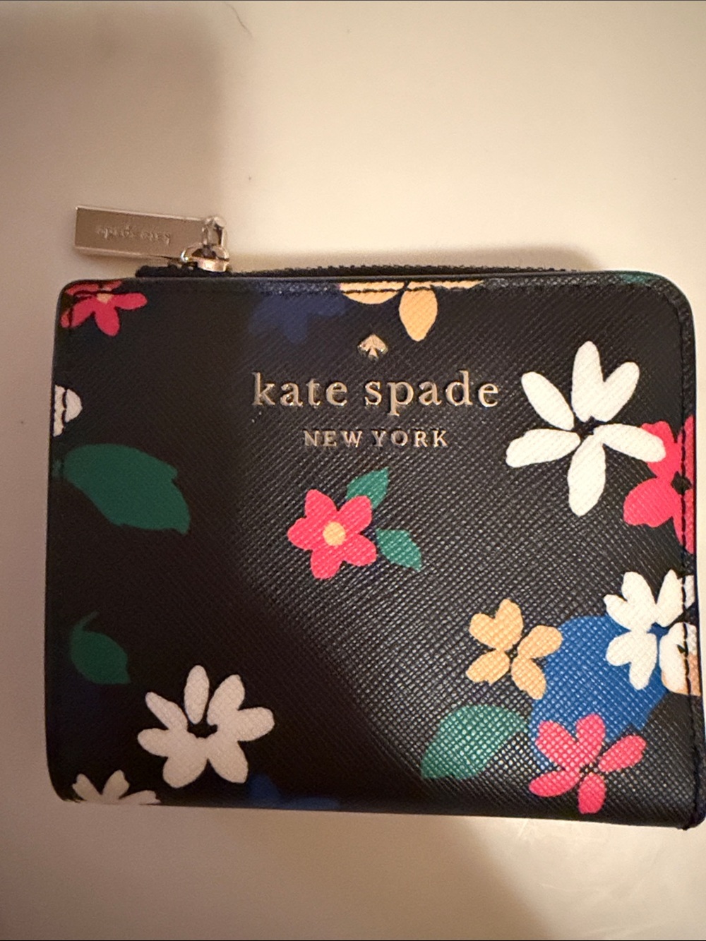 kate spade floral zip-around wallet in black with multicolor blooms